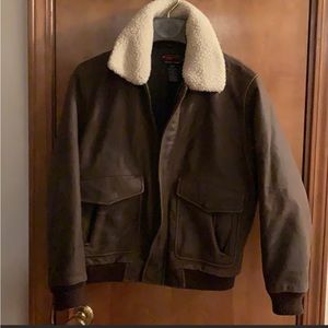 Genuine Leather Bomber Jacket. Lining with
many pockets inside & out. Versatile.